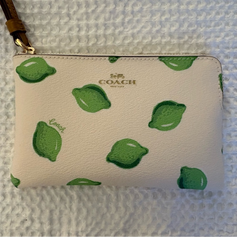 Coach Wristlet with Green Lemon Design on Cream